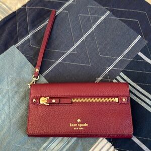 Kate Spade burgundy wristlet wallet